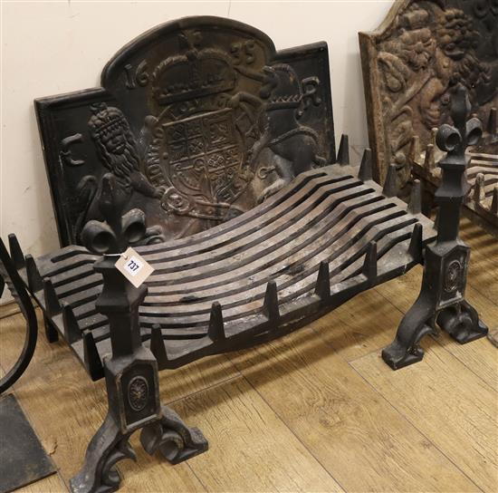 A cast iron fire-back, decorated with Royal Armorials, together with a fire-back and fire-dogs fire-basket W.76.5cm, fire-back W.67cm